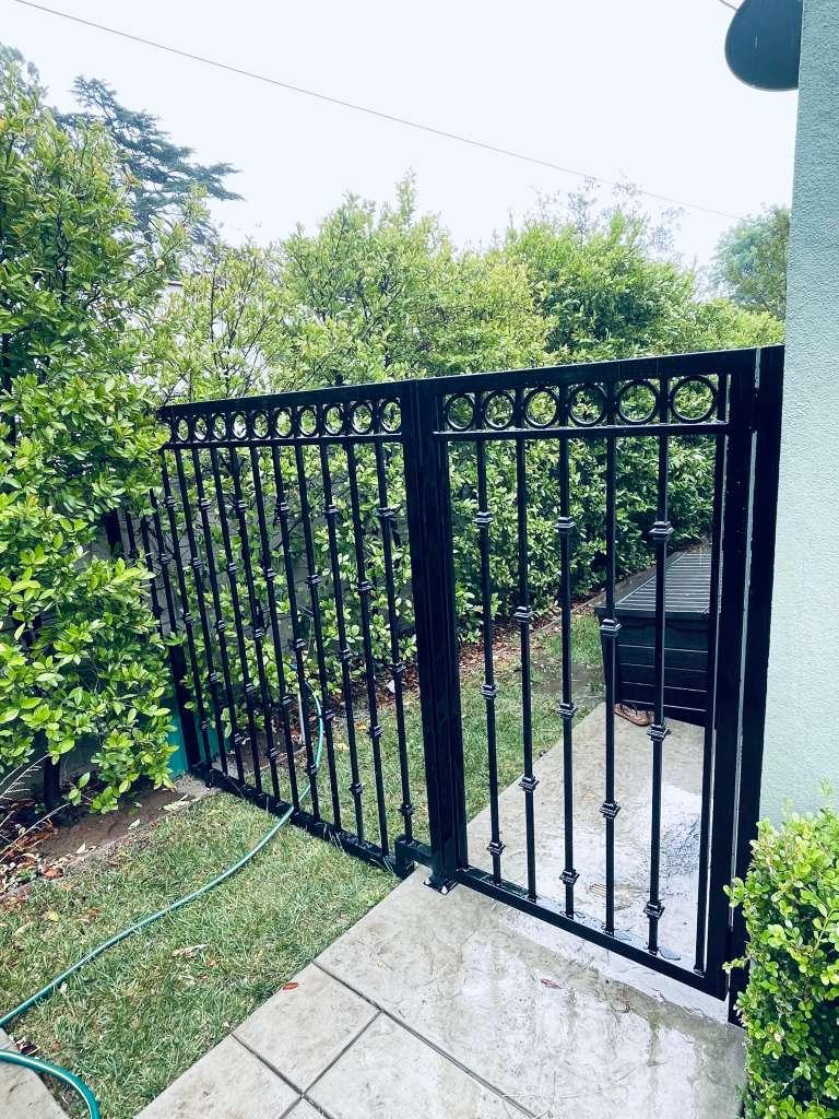 Residential fencing and deck construction detail during project completion