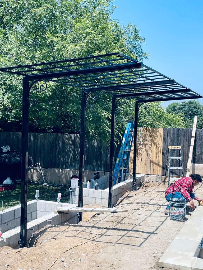 Custom iron enclosure work at a home exterior