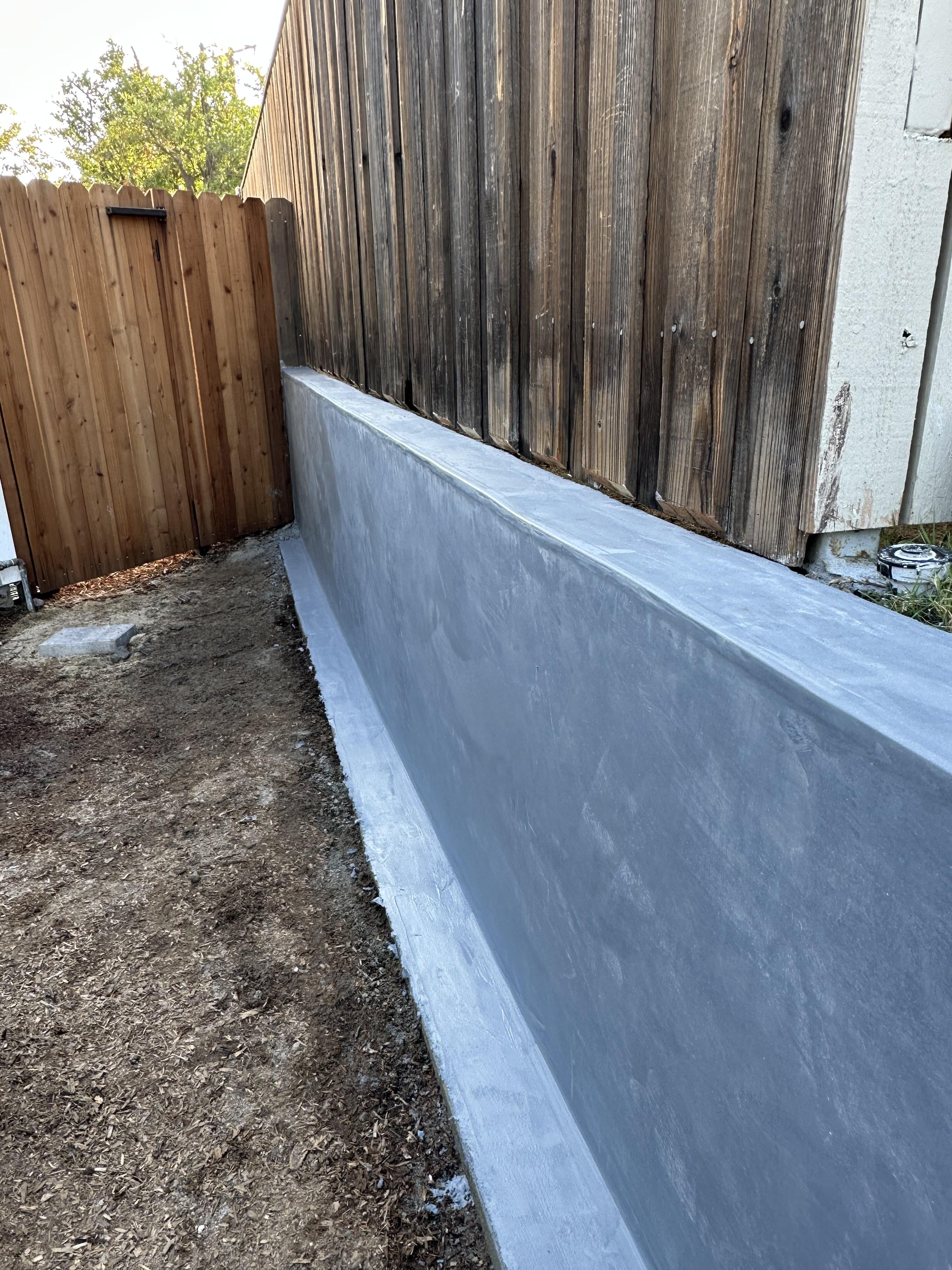Concrete and masonry work completed at a home exterior