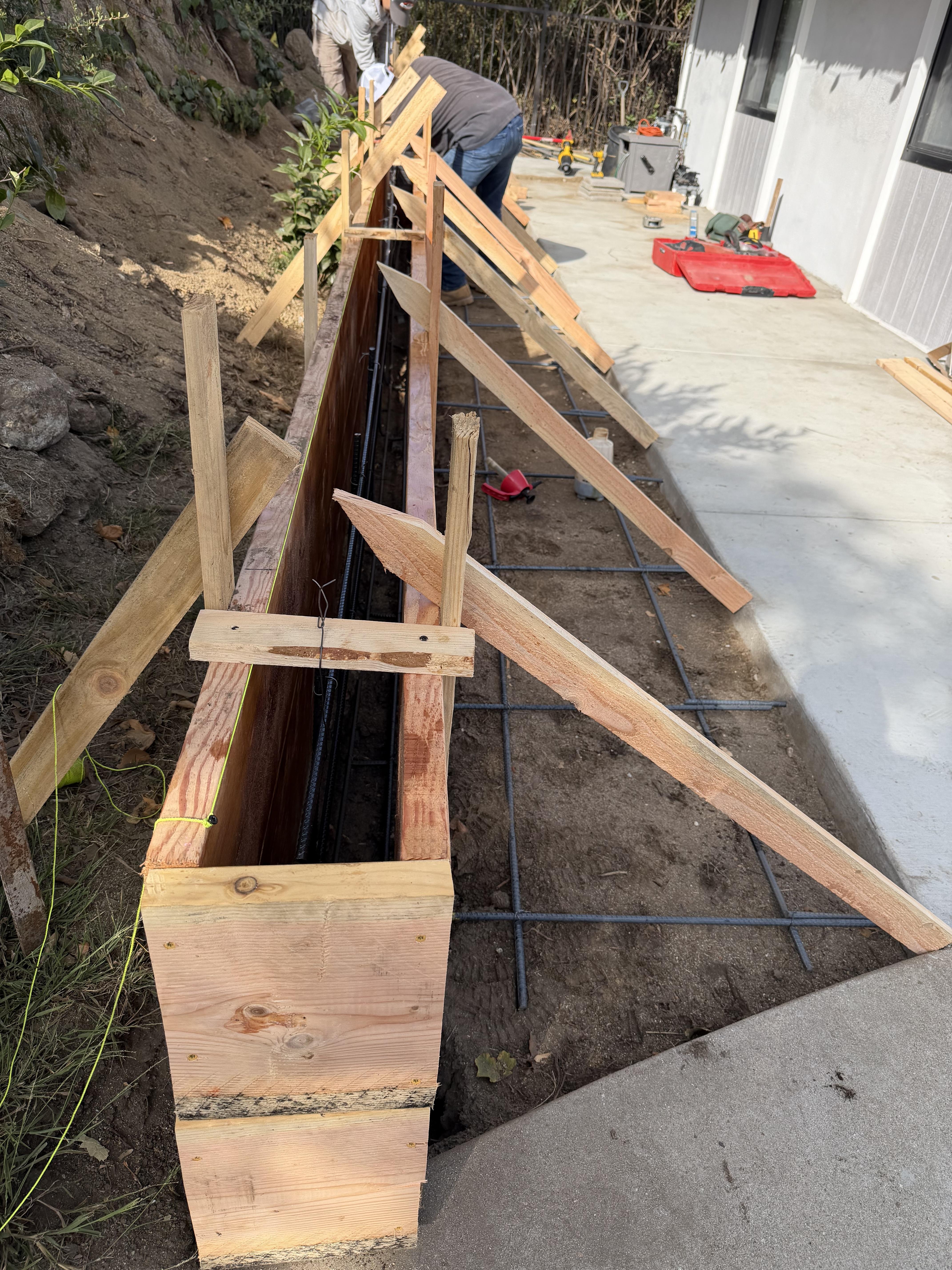 Final view of a completed residential concrete and masonry project